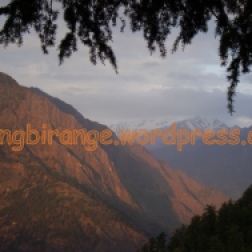 Himalayan peaks take on orange hue at sun down